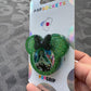 We don’t talk about Bruno mouse w/Bow Shaker Phone Grip-Green